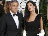 Amal Clooney in Haute Couture Dior and white gloves from her personal collection