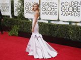 E! News fashion correspondent Giuliana Rancic brings the drama in pink gown at the Golden Globes 2015
