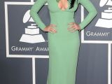 Katy Perry shows off her amazing figure in bold pastel dress