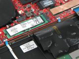 To remove the SSD take out the screws