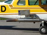 Cessna airplaine equipped with seeding device