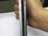 Huawei's Ascent Mate7 thickness compared against iPhone 6 Plus