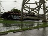 Train cars blown off bridge by strong winds