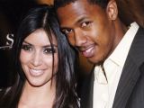 Kim was secretly involved with Nick Cannon at the time