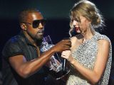 Kanye West walks up on stage to interrupt Taylor Swift at the 2009 VMAs