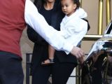 North West arrives with mom Kim at Kourtney Kardashian's third baby shower