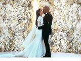 Kim Kardashian and Kanye West on their wedding day, 2014