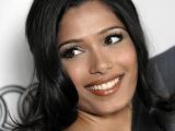 Critics say L’Oreal made Freida Pinto several shades lighter for the new ad
