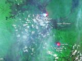 Satellite view shows lava lakes and gas plumes from Nyamuragira and Nyiragongo volcanoes