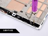 Removing three screws securing the GPS antenna on the Lenovo Yoga 2 Tablet