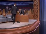 In the end, Liam Hemsworth ditches the heels, returns to his chair in his socks