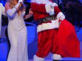 Mariah Carey and Santa have some fun on stage