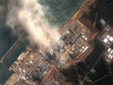 This is an overview of the Fukushima Daiichi nuclear power plant, showing the four damaged reactors buildings