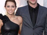 Miley Cyrus and Liam Hemsworth confirmed they were dating at the premiere of “The Last Song”