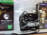 Custom Mortal Kombat X controller next to Xbox One and PS4 special editions