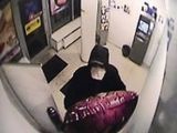 ATM burglar obstructed security camera view with balloon