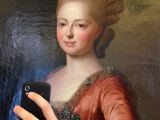 High society lady snapping a selfie