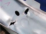 Damage to a component made out of high-strength steel after a crash test