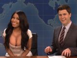 Nicki Minaj is having so much fun she can hardly keep from laughing