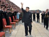 Kim Jong-un waves at his admirers