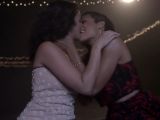 Rosario Dawson and Jenny Slate ring in the New Year with a passionate kiss