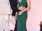 Scarlett Johansson is ambushed by Travolta at the Oscars 2015