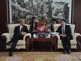 Apple CEO Tim Cook in a meeting with Miao Wei, head of the Ministry of Industry and Information Technology