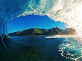 Daredevil surfer captures amazing shots from inside waves
