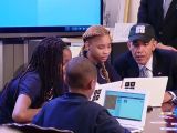 Obama learning how to code from students