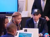 Obama writing his first line of code