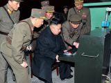 Kim Jong Un working on a computer