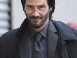 Keanu Reeves sports cuts and bruises on the set of "John Wick"