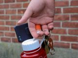 Neverdrop lets you carry things and hold your phone at the same time