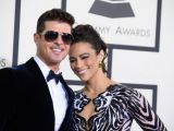Robin Thicke and soon-to-be-ex-wife Paula Patton, on whom he cheated