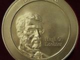 Loebner Prize medal: Hugh G. Loebner side