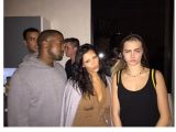 Kanye West, Kim Kardashian (with bleached eyebrows) and model Cara Delevingne
