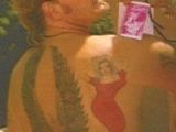 Mark and the angel tatoo he got together with Anna Nicole