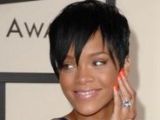 Rihanna is not afraid to don a neon-bright nail polish