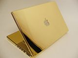The 24-carat gold MacBook Pro, complete with diamond studded Apple logo