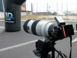 Oversized telephoto lens attached to NEX-3