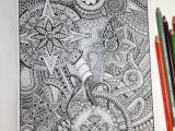 Intricate pieces of art included in a coloring book for experts