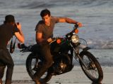 Taylor Lautner during a photoshoot for Rolling Stone on a beach in LA