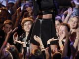 Mixing with the fans: Taylor Swift performs on The Voice
