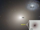 Dwarf galaxy M60-UCD1 sits below the gargantuan galaxy M60 in this Hubble Space Telescope image