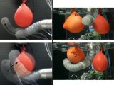 Images show the robotic arm interacting with balloons
