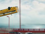 The bus on a bridge cliché, now with a 360 degree flip