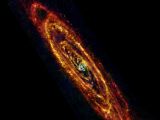 Andromeda in far infrared, stars are forming in the visible regions, the coolest in red, but not in the dark areas