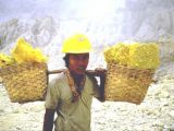 Worker transporting sulfur