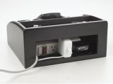 A built-in power strip and hidden adapter compartment for a neater look