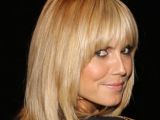 Heidi Klum's fringe 'do looks great with her face and hair color